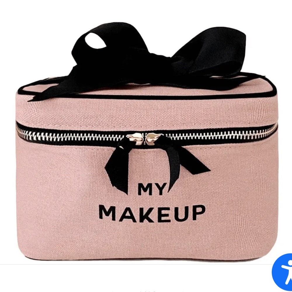 Bag-all blush pink make up case.
